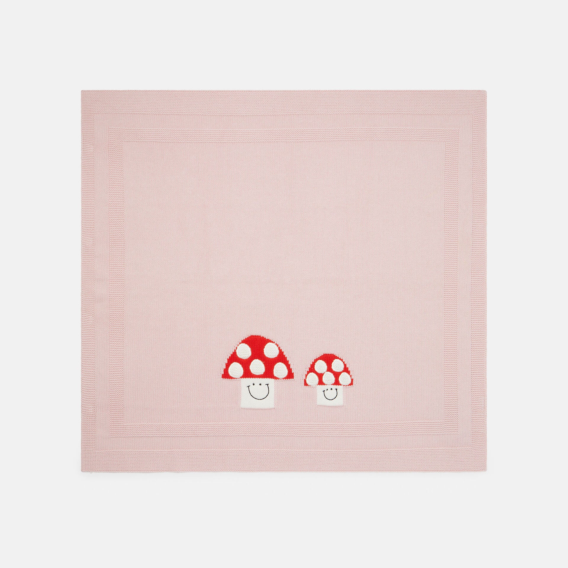 Strickdecke mit Pilz-Motiv