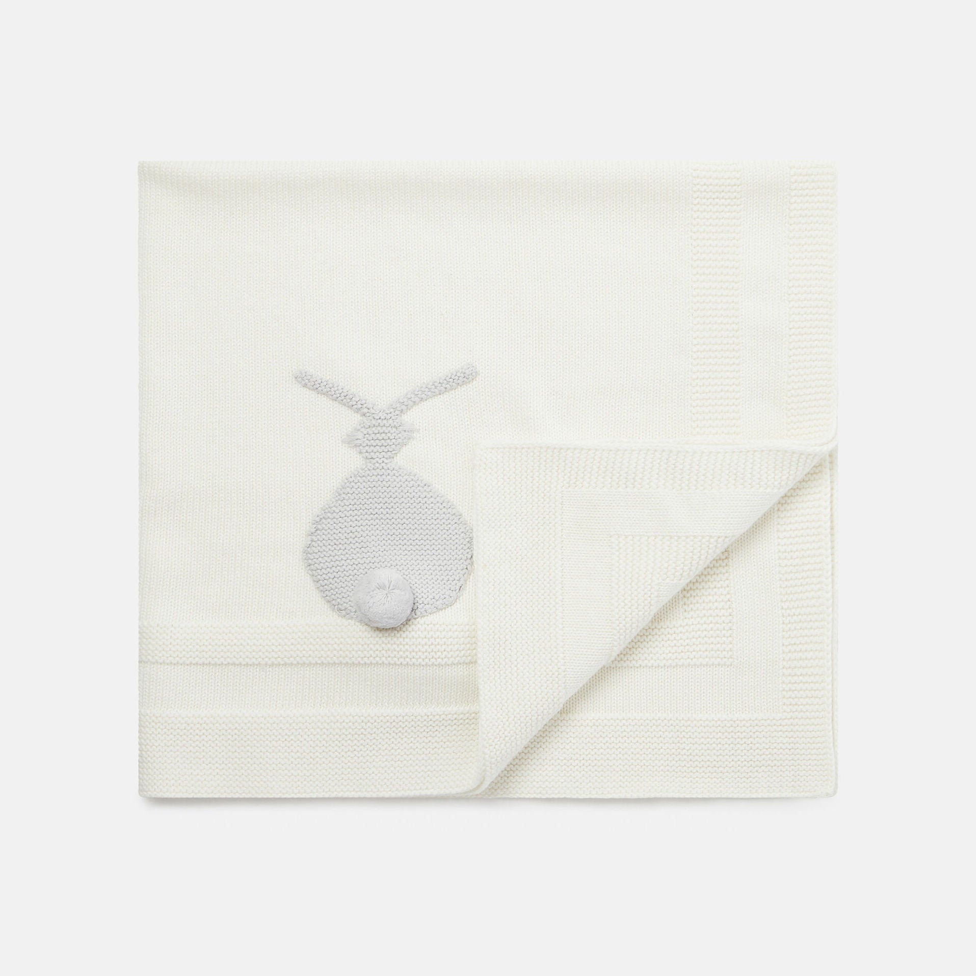 Strickdecke mit Hasen-Motiv